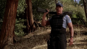 Sisk leading an angry armed mob after Mange