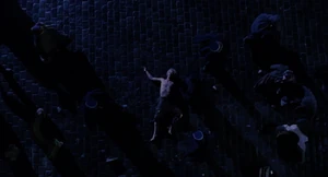 A crowd gathering around Dr. Jekyll's body.