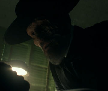 The man with the black hat on sale