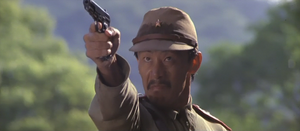 Lieutenant Tay attempting to shoot Rambo