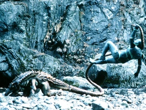 Lizard Man 3.jpg (347 KB) Lizard Man whips J with his tail.