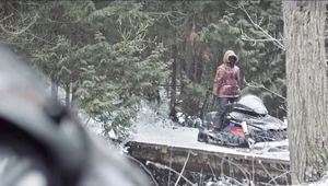 Judith Bridge.jpg (211 KB) Judith stands up from her snowmobile.