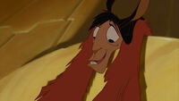 Kuzco saving Pacha from falling to his death