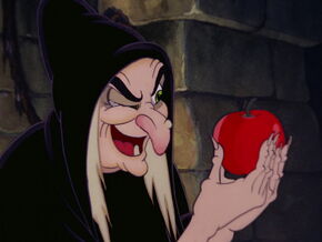 Queen Grimhilde satisfied with her poisoned apple.