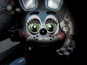 Toy Bonnie staring into the camera.