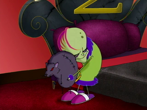 Rat "hugging" Dr. Zalost before being berated.