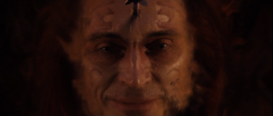 Durza fades away after being shot in the forehead with an arrow.