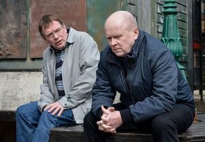 Phil is comforted by Ian over Peggy's death and his own problems with alcoholism (2016).