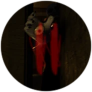 Kyogi's hand on the badge for completing Jealousy's Book: Chapter I on Normal Mode.