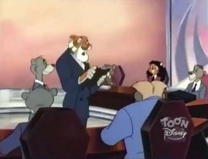 Shere Khan overseeing a meeting with his fellow employees.