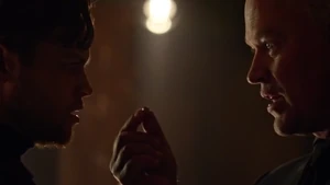 Machin with Damien Darhk.