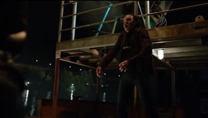 Faust is pinned to the railing