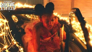 Kimmy exiting her vehicle.