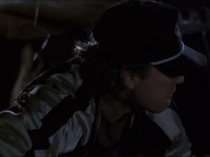 Bill locking the van door.
