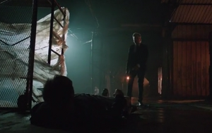 The Dollmaker attacking Quentin Lance.