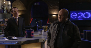 Phil has recuperated from the shooting and confronts Steve at his nightclub (2002).