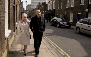 Phil taking Peggy for a walk around London (2016).