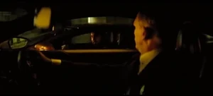 Hinx chasing Bond in a car chase.