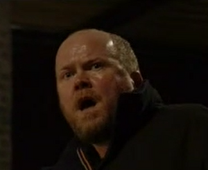 Phil Mitchell is spotted by police and is ultimately apprehended by them.