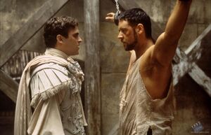 Commodus wearing his white and last armor, confronting Maximus.