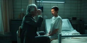 Brenner checking Eleven's injuries due to suffering from a concussion in the Rainbow Room last night.