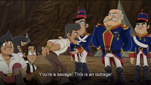 Torreblanca listening to the discrepancies that Mandujano directs him for wanting to shoot a child.