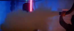 Skywalker jumped down, grabbed the severed hose, and used it to spray gas into Vader's masked face.