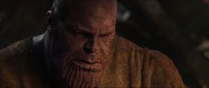 Thanos' scarred face.