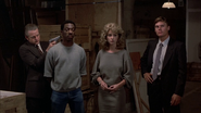 Casey holding Foley and Jenny Summers at gunpoint
