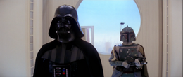 Vader states it would be an honor if the captured party joins them with Fett standing behind him.