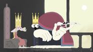 The Double King holding the skull of Ratking Augustus the Agreeable after pulling it out of his head