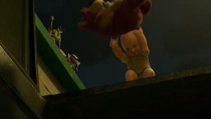 Big Baby throws Lotso into the dumpster