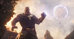 Thanos using an infinity stone to break apart a moon and throw its pieces at his enemies.