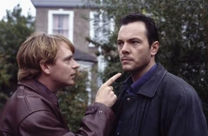 Ian Beale clashing with his half-brother David Wicks over the latter's affair with Cindy.
