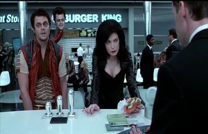 Scrad, Charlie, and Serleena in MIB headquarters.