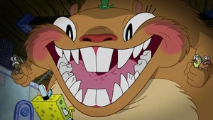 Cuddle's evil grin, revealing his true nature.