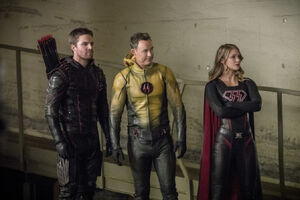 From left to right: Dark Arrow, Reverse-Flash, Overgirl