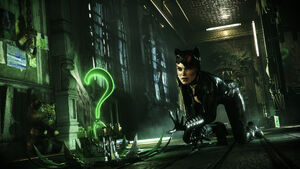 Promotional wallpaper of Catwoman moving to grab a Riddler Trophy.