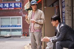 Sang-woo tells Gi-hun about the real gravity of his money problems.