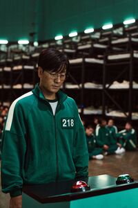 Sang-woo decides to vote for the games to continue.