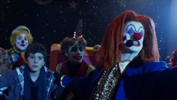 Chris is about to be shoved into the big jack in the box the clowns can turn him into a clown