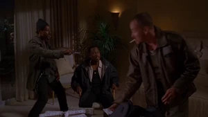 Charlie aiming to kill T. Paul...