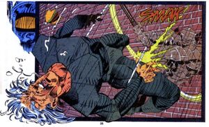 Kron Stone being hit in the face by Punisher 2099's Power Bat.