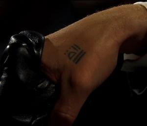 Kounen's Familiar tattoo.