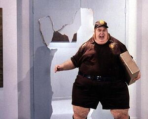 Fat Bastard disguised as a mailman.