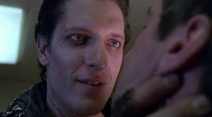 The Kurgan terrorizing the motel's manager.