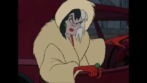 Cruella looking at the disguised puppies