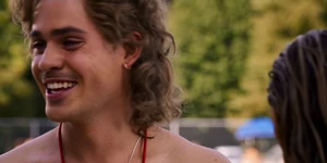 Billy chuckling when Karen compliments on him before she corrects herself.