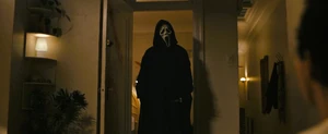 Ethan appears in the living room after "killing" Quinn, looking at Mindy.