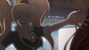 Junko ordering a Reserve Course student to kill himself to demonstrate the power of the Despair Video.